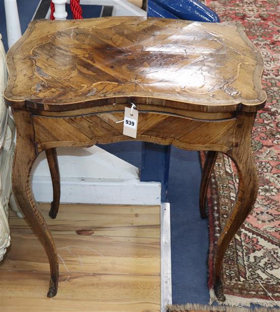 A late 18th century Italian walnut, rosewood and amaranth marquetry-inlaid serpentine writing table W.64cm